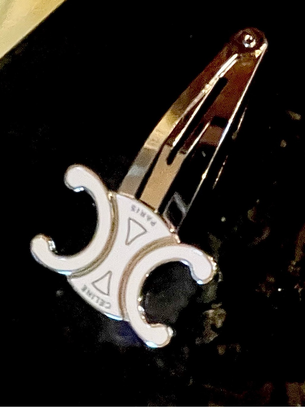 Single Silver- Metal Hair Clip White Enamel Logo this was part of a promotion